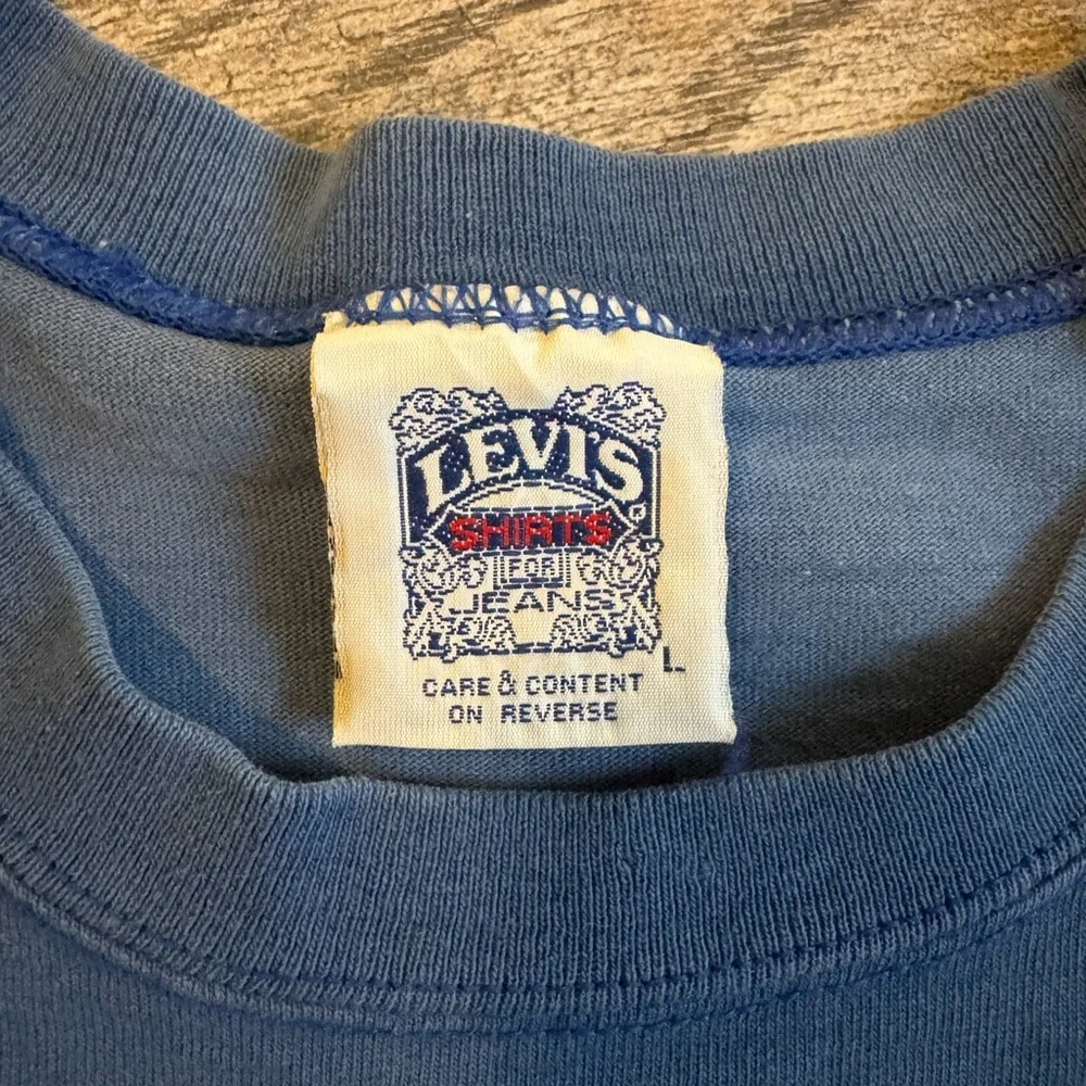 Vintage 1993 Levi's Strauss & Co blue Graphic Tee